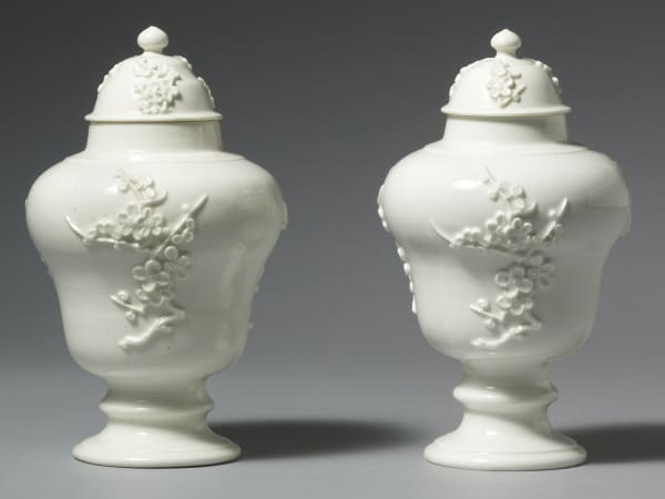 A very rare Pair of Bow White Prunus Vases and Covers, Circa 1752-55.