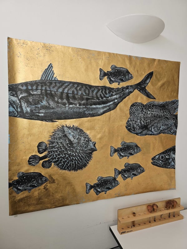 Contemporary artwork of fish with gold leaf