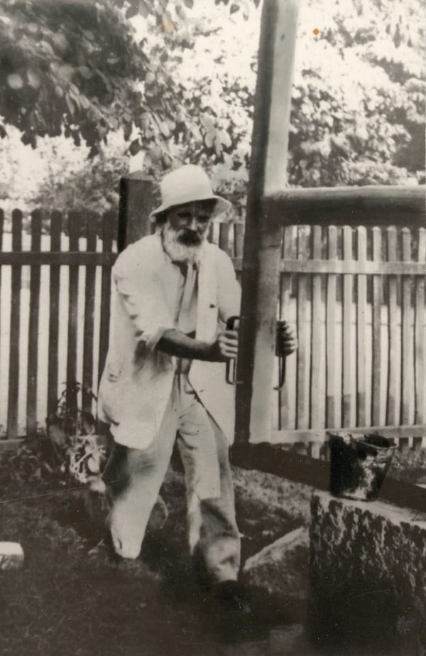 Constantin Brâncuși (1876-1957) Micu Marcu; Brancusi working on the door of The Kiss, Targu jiu, July 2, 1938 Stamped and annotated on verso Gelatin silver print, printed c. 1935 5 x 3 1/8 in (12.7 x 7.9 cm)