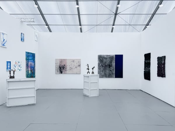 View of AFIKARIS Gallery's Untitled Miami showing works by Nasreddine Bennacer, Eva Obodo, Omar Mahfoudi and Hervé Yamguen