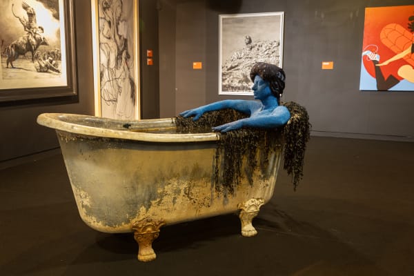Beya Gille Gacha's sculpture of a blue lady in a bathtub at Saint Raphael's Museum d'Archéologie. Courtesy AFIKARIS Gallery