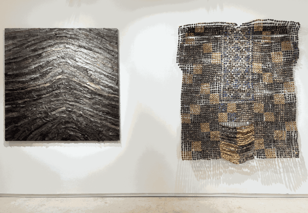 Installation view of AFIKARIS Gallery's booth at 1-54 Marrakech 2025 featuring Ozioma Onuzulike and Mouhcine Rahaoui