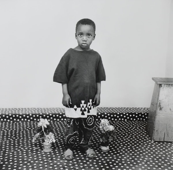 Malicksidibe Studio Portrait A Child In Love With Flowers