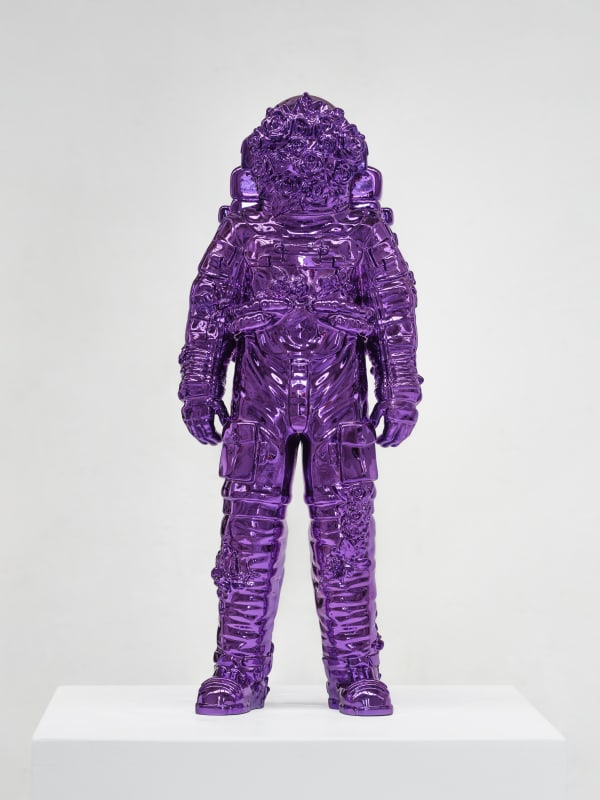 Marble sculpture featuring a spaceman his suit fill of flowers, part of the 'Spaceman Shine' series by artist Filippo Tincolini view from the front right