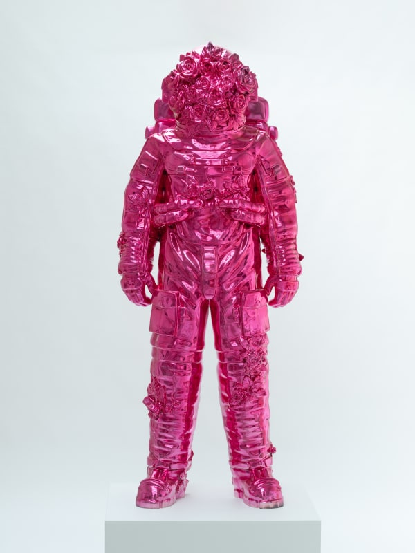 Marble sculpture featuring a spaceman his suit fill of flowers, part of the 'Spaceman Shine' series by artist Filippo Tincolini view from the front left