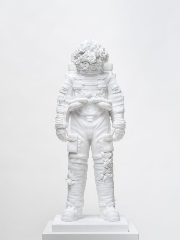 Marble sculpture featuring a spaceman his suit fill of flowers, part of the 'Spaceman' series by artist Filippo Tincolini view from the front