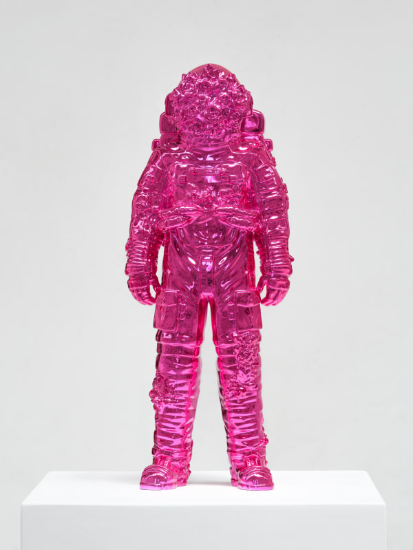 Marble sculpture featuring a spaceman his suit fill of flowers, part of the 'Spaceman Shine' series by artist Filippo Tincolini view from the front left