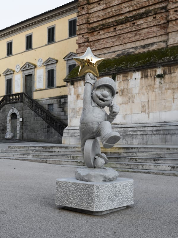 Marble sculpture featuring a spaceman his suit fill of flowers, part of the 'Spaceman' series by artist Filippo Tincolini view from the front