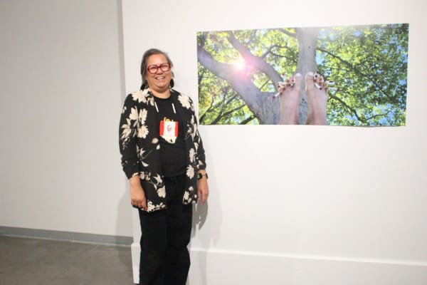 Michael Oleksyn/Daily Herald Marcy Friesen posed with a piece from her exhibition “Shooting the Breeze” ahead of the opening of the exhibition at the Mann Art Gallery on Saturday.