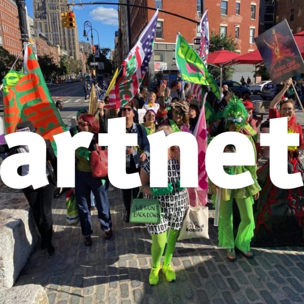 Michele Pred leads feminists artists on an abortion rights protest march