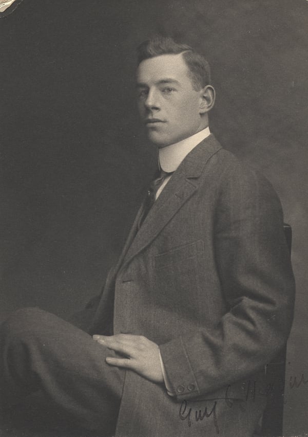 Guy C. Wiggins, circa 1910. unknown photographer This media file is in the public domain in the United States.