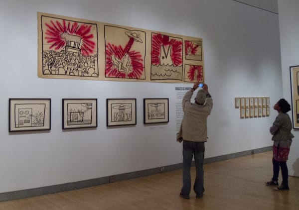 Keith Hearing exhibition at Brooklyn Museum in NYC, Photo: October 4, 2011 "Keith Haring at Brooklyn Museum" by pandemia is licensed under CC BY 2.0.