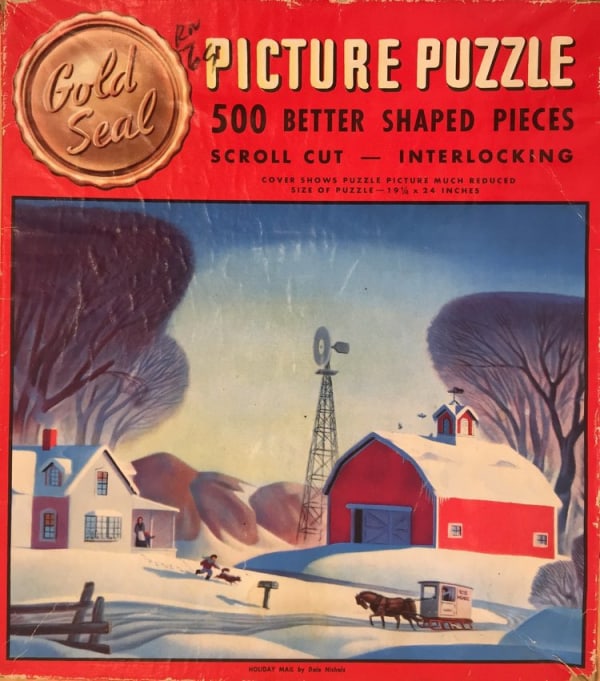 Dale Nichols work on a Gold Seal picture puzzle.