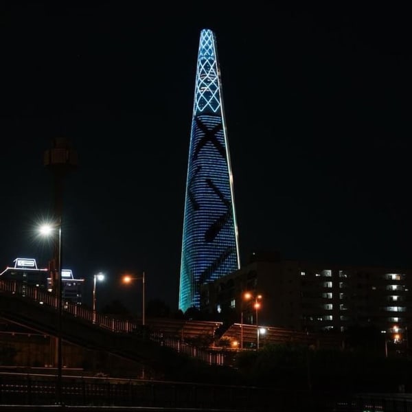 KAWS digital installation on the Lotte World Tower in South Korea
