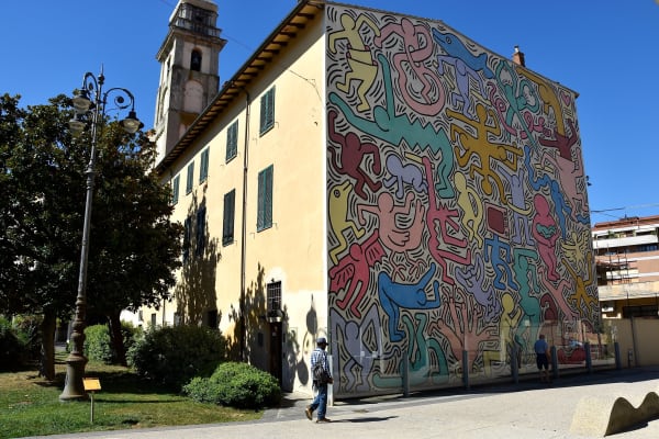 San Antonio Church Pisa 'Tuttomondo' (1988) by American artist Keith Haring Photo by FaceMePLS is licensed under CC BY 2.0. Taken on August 25, 2016