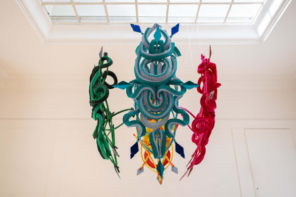 GRACE LILLIAN LEE, Winds of the Guardians 2025, cotton webbing, goose feathers, timber cane, cotton and wool thread dims variable