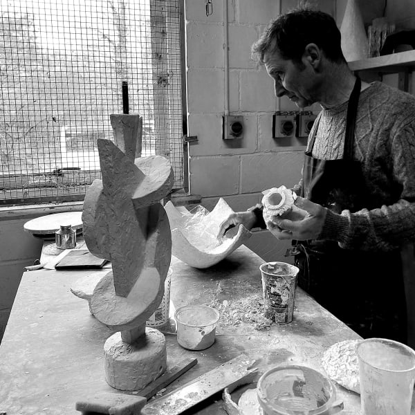 Martin making the plaster lamp