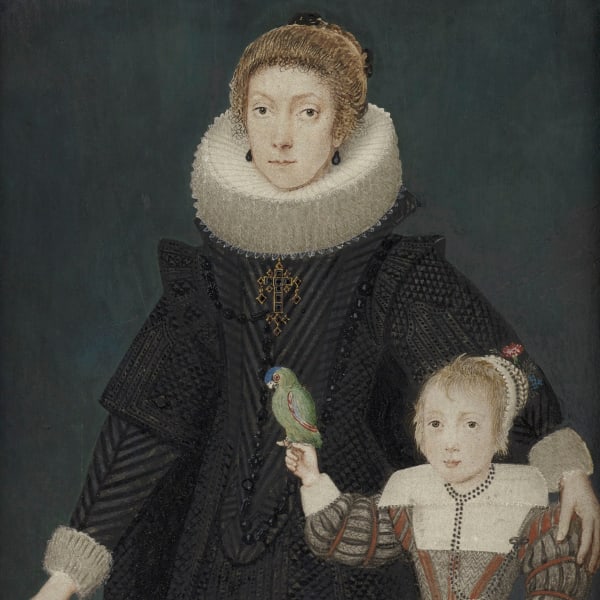 A Mother and Child holding a parrot