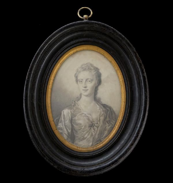 Thomas Forster - Portrait minature of a Lady wearing a satin gown, fastened with a gem-set brooch, and a cloak draped across one shoulder, c. 1700