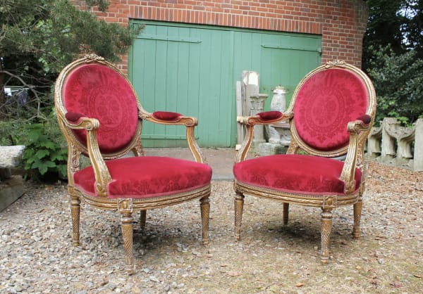 Pair of French gilt wood armchairs