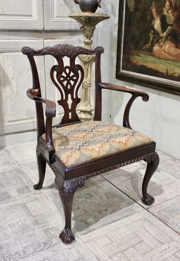 19th century English carved mahogany armchair in the 18th century manner with a bargello covered drop in seat