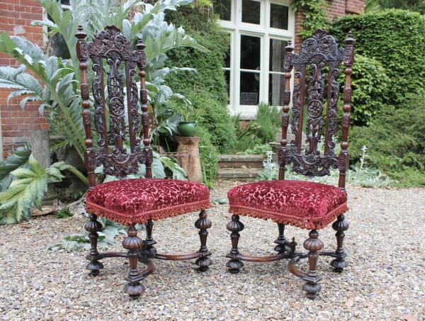 Pair of baroque 18th century carved walnut side chairs