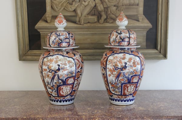 Pair of 19th century Imari palette vases with original lids