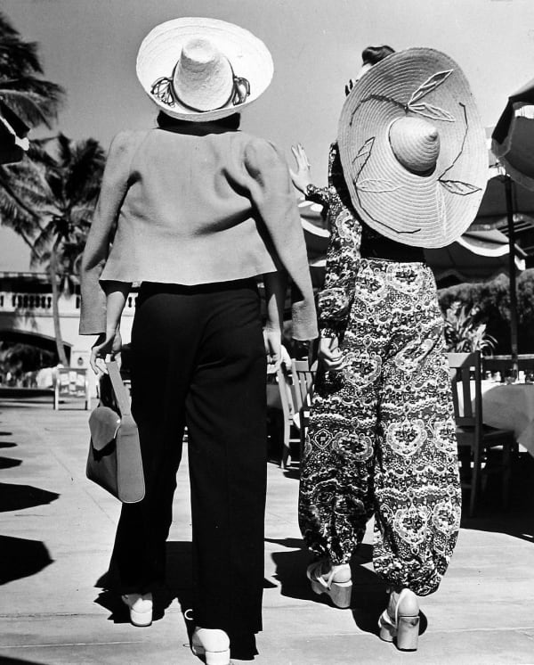 Alfred Eisenstaedt, Model Stephanie Nikashian with friend in front of hotel. Miami Beach, FL, 1940