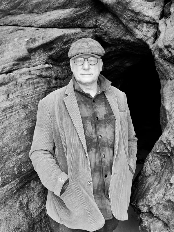 Phill Hopkins - Figure in the breaking sunlight beyond the wood, 2025