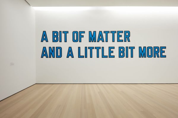 Lawrence Weiner. A BIT OF MATTER AND A LITTLE BIT MORE. 1976. Installation view, The Museum of Modern Art