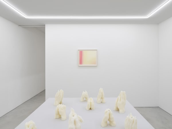 Drawing for Glowing Hour, 2023, oil on paper, 38 x 46 cm In dialogue with sculptures, each, Look at This Unbearable Darkness, 2024, wax, various dimensions