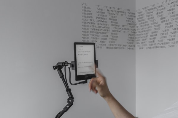 Detail: Memories, 2023, e-book reader, multi-arm clamp, recliner chair, dimension variable, Curtesy of CYJ Art Studio