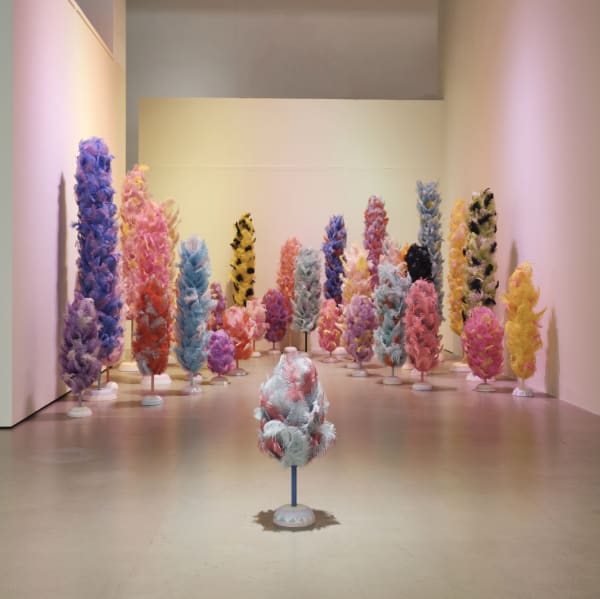 Duster Clump, 2017, ostrich Feather, PVC pipe, plaster, pigment, perfume, dimensions variable