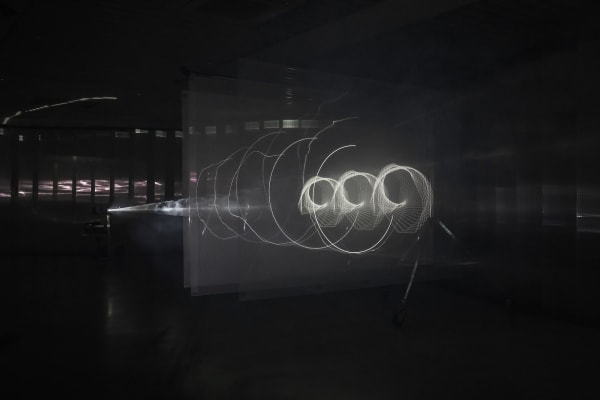 광선조각, 2022, HD video, loop, sound, beam projector, fog machine, polycarbonate, wood