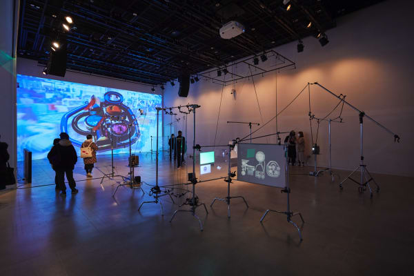 Film Machine_Flip Flap Loco, 2021, 16mm Film Installation, loop, roller, C-stand, hologramscreen