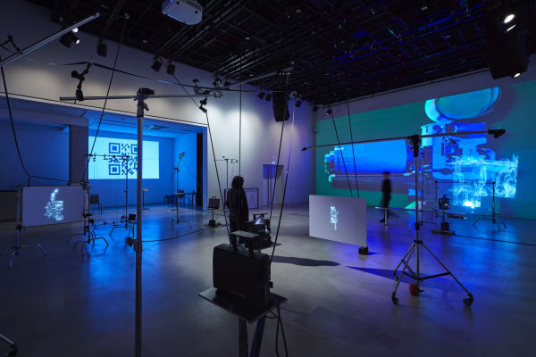 Film Machine_Flip Flap Loco, 2021, 16mm Film Installation, loop, roller, C-stand, hologramscreen