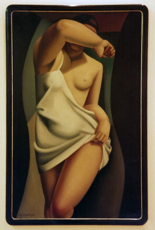 A nude woman raises her arm to cover her face, painted in an Art Deco style