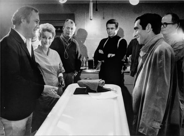 Hatami, Director Peter Yates, Steve McQueen and crew discussing a scene, on the set of “Bullitt”, 1968