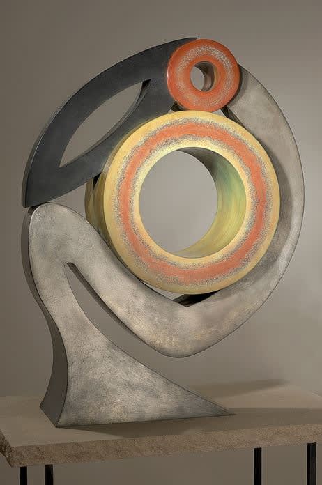 Silver, black, yellow, and orange sculpture