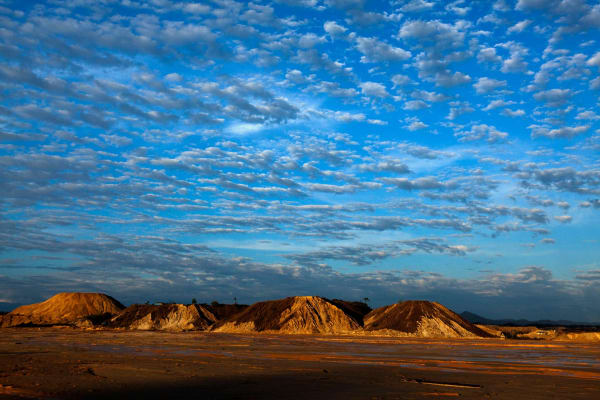 Sky and mountain scape of the destroyed rainforest near the city of Huepethaue