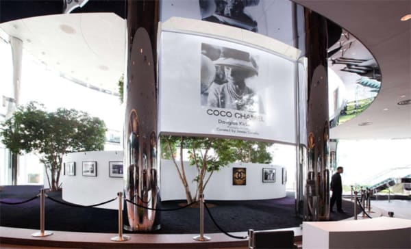 Exterior view of The Rotunda in Hong Kong displaying an exhibition of photographs of Coco Chanel taken by Douglas Kirkland in 1962