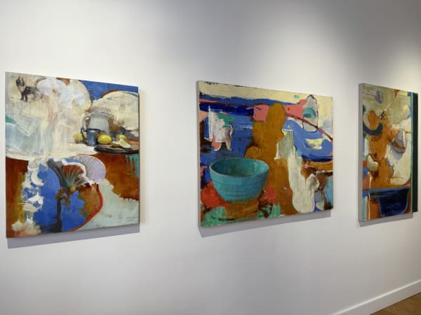 a gallery wall showing paintings by Randall Sexton