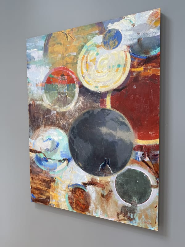 a gallery wall showing paintings by Randall Sexton