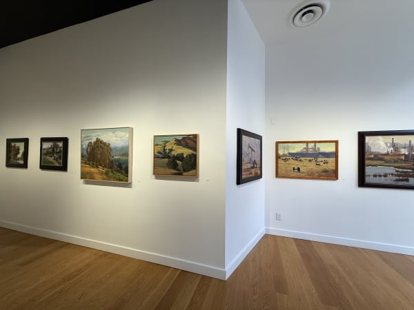 a gallery wall showing paintings by Randall Sexton