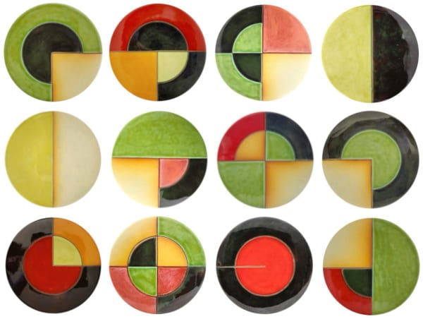 a grid of glazed ceramic circles