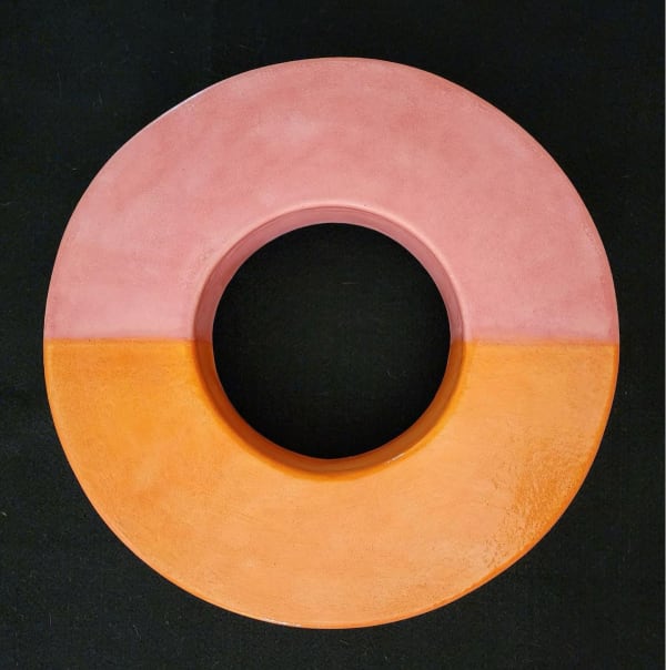 a donut shaped ceramic sculpture