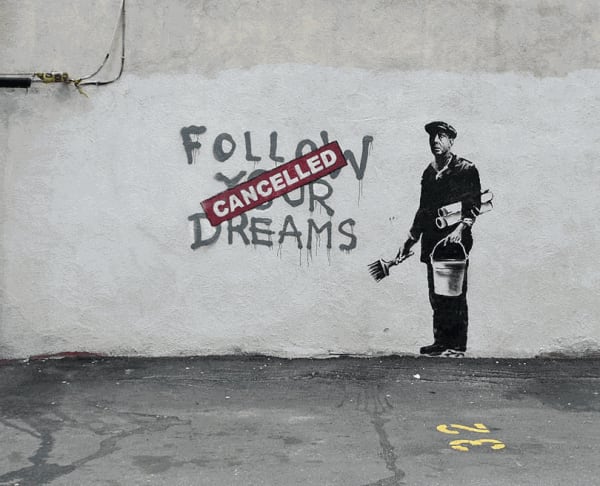 Banksy’s 2010 Follow Your Dreams Cancelled mural shows worker painting slogan, clever cultural critique.