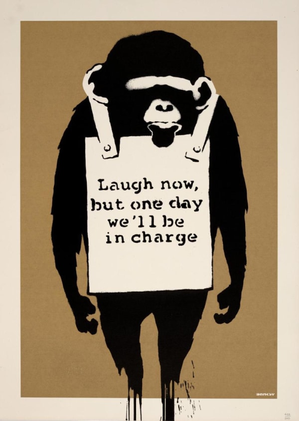 Banksy’s 2003 Laugh Now monkeys wear aprons saying “laugh now”, evolution and control theme.