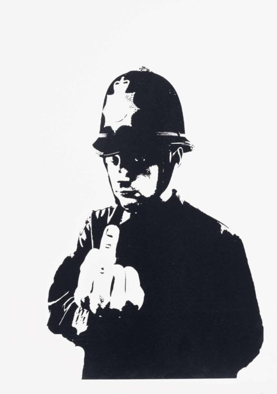 Banksy’s 2002 Rude Copper police officer gives middle finger, bold anti-authority street art.