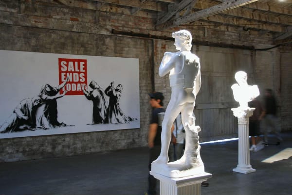 Banksy, Barely Legal exhibition sculpture, Los Angeles, 2006 – satirical three-dimensional artwork critiquing consumerism and politics.